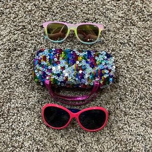 2 pair kids sunglasses and 1 case.
